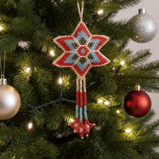 Beaded star ornament hanging on tree