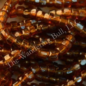 Antique Seed Bead 11/0 Translucent Brown Cuts