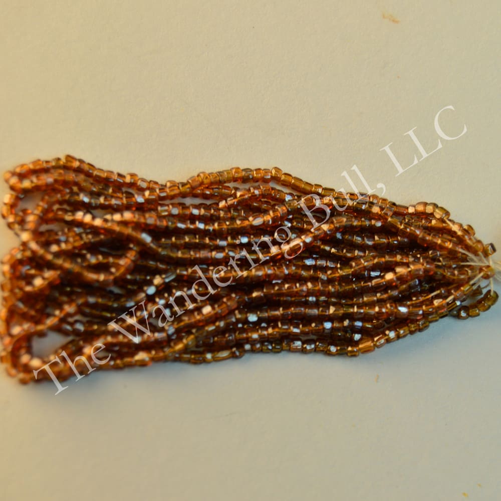 Antique Seed Bead 11/0 Translucent Brown Cuts