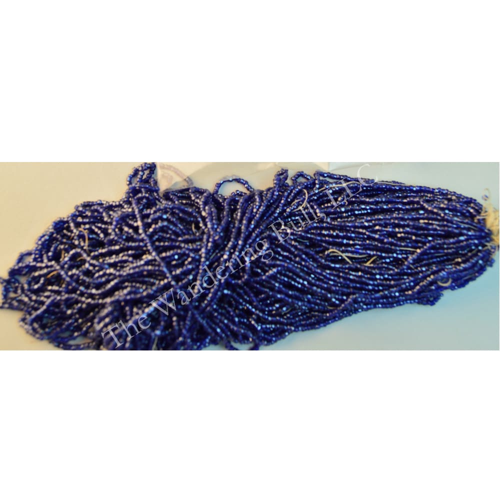 Antique Seed Bead 11/0 Translucent Royal Blue Cuts