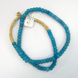 Padre Trade Beads Blues single strand on natural fiber