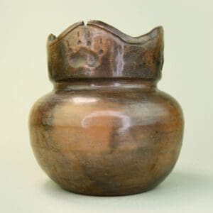 Brown Six Nations pottery with paw print. 1