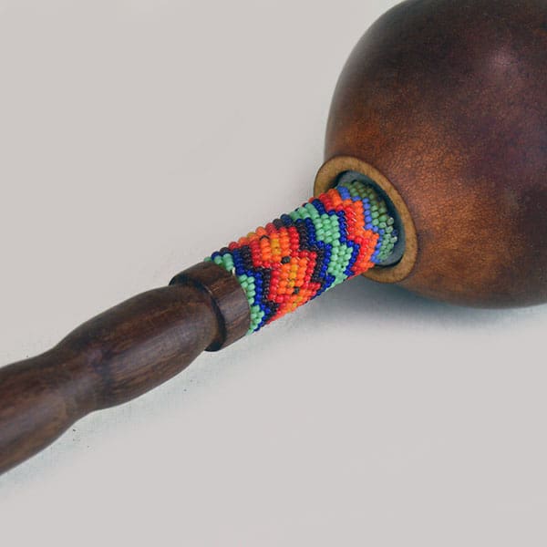 Gourd rattle with beaded design. 2