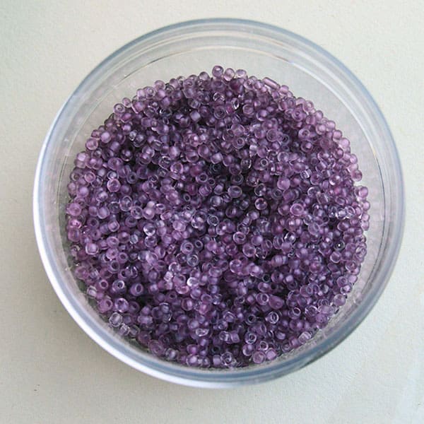 12/0 Medium purple antique seed beads.