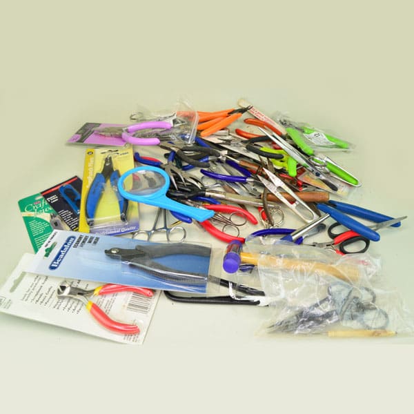 Assorted bag of craft tools.