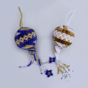 Assorted beaded ball ornaments.