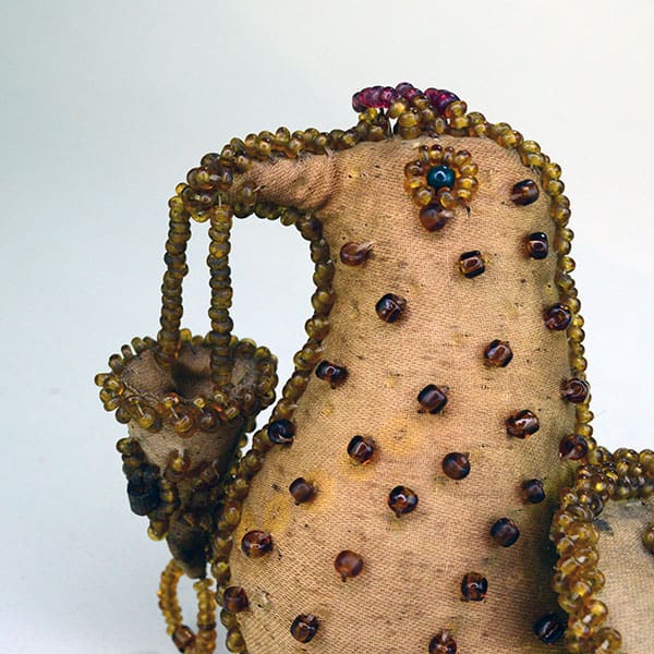 Beaded gold bird whimsey with dangles. 2