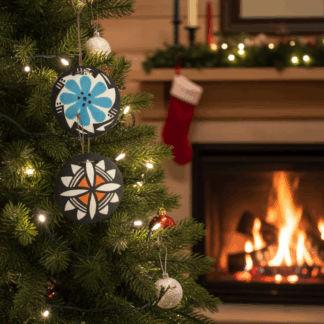 Acoma pottery ornaments hanging on a Christmas tree.