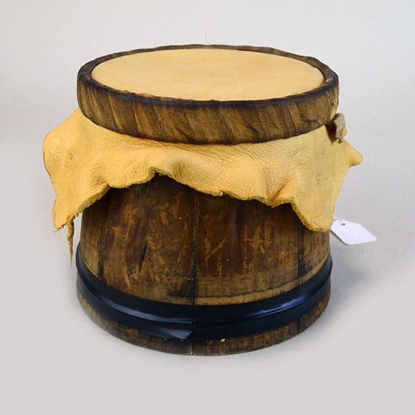 Small handmade wooden water drum.