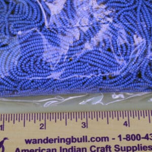 Half-kilo of 13/0 light blue seed beads.