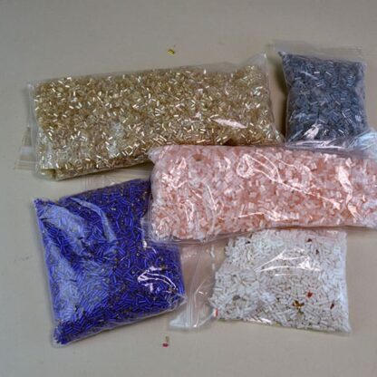 This Bugle Bead Lot comes in a 29 ounce package. They are of Different Sizes and Colors. 