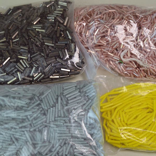 These Bugle Beads Assorted sizes and Colors in a 29 ounce package