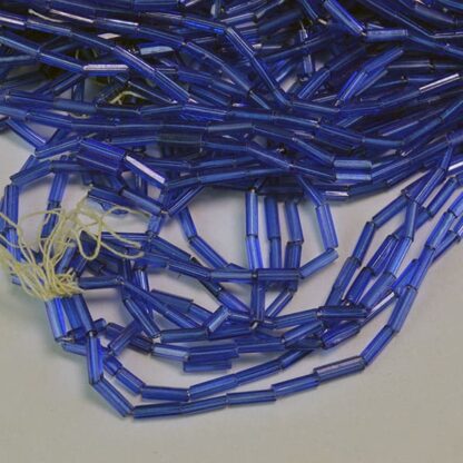 These Bugle Beads Blue come in a 11 ounce package. They are 6mm long and 2mm wide