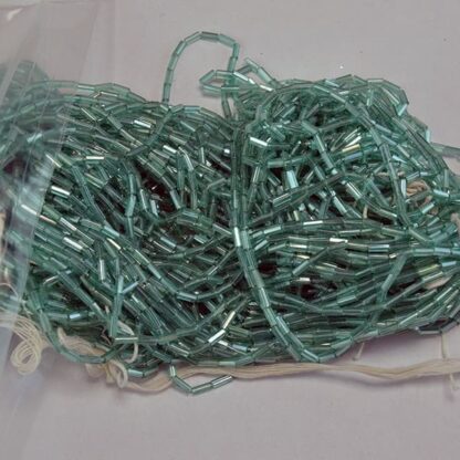 These Bugle Beads Seafoam Green come in a 15 ounce package. They are 4mm long and 2mm wide.