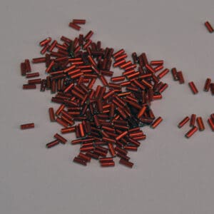 These Red Bugle Beads are lined and come in a 25 oz bag. They are 4 x 1.6mm. The very narrow diameter allows more detail to be put into your designs.