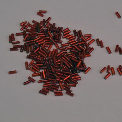 These Red Bugle Beads are lined and come in a 25 oz bag. They are 4 x 1.6mm. The very narrow diameter allows more detail to be put into your designs.