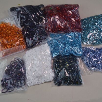 These Bugle Beads, come in a assorted iridescent and silver lined 29 ounce package