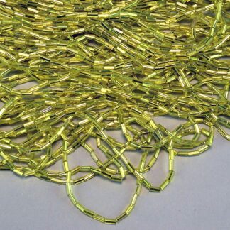 These Yellow Lined Bugle Beads come in a 1/2 kilo. They are 4mm long and 2mm wide. The very narrow diameter allows more detail to be put into your designs.