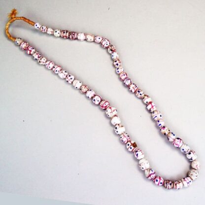 These Venetian Trade Beads are on a Fiber Strands with white trade beads with pink lines and Blue dots. . Limited Quantities.