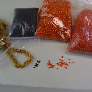 10/0 Seed Bead Lot: Gold orange and black