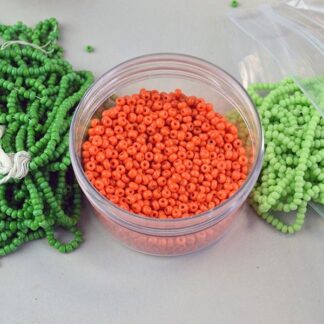 10/0 Seed Bead Lot the Green is 8oz , Chartreuse are 10oz and Orange 20 oz . 