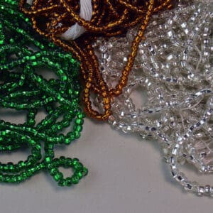 9/0 Silver Lined Seed Beads come in assorted colors in a 22 ounces package. Add sparkle and interest to your beading projects. one of a Kind.