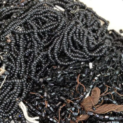 This Black Glass Beads Lot comes in many Different Sized and Cuts. Seed Beads, Tube beads and more. This lot comes in a 25 ounce package. One of a Kind !