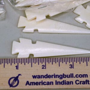 Bone Arrowhead Pendant lot will look great on necklaces, and chokers. 3" long x almost 3/4"wide. These have NO holes. 69 pieces. One of a Kind !