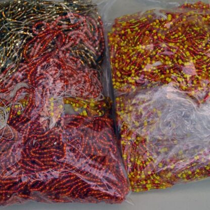 This Seed Bead 17 Ounces Lot in yellow Amber, trans red, color lined Pink, silver lined trans Red, Orange/gold, Yellow, Tubular Silver Lined gold and Amber.