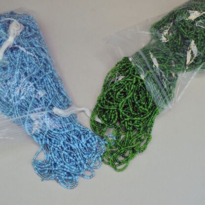 Seed Beads 11/0 Green and Blue lot. They come in a Light Blue , Trans Green , Green, a silver lined light Blue, and a dark Green. 11/0, 14 oz package. One of a Kind.