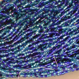 These Tube Beads Silver Lined. the Colors are silver lined light blue and navy. They are in a 16 ounce package. Limited Quantities!