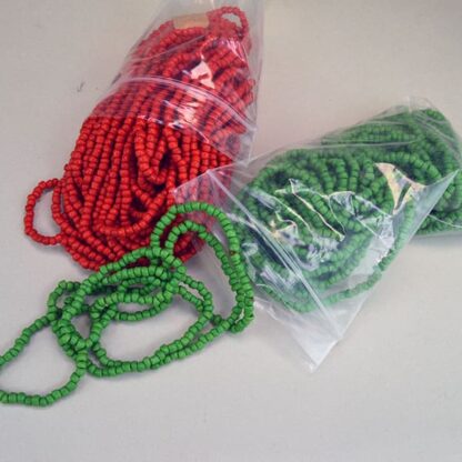 Vintage Beads from Hong Kong, color are Red and Green. This lot of Beads are not Uniform in Size. They come in a 18 ounce package. One of a Kind.