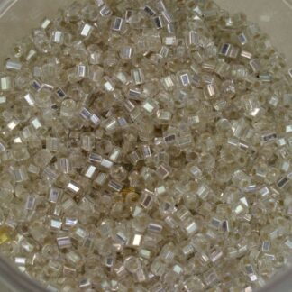 clear with silver shimmer. Bugle beads are # 1 2mm x 1mm , and come in a 11.5 oz bag.