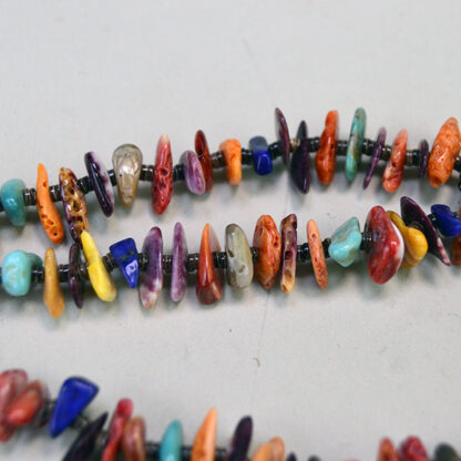 Ready to wear is this Necklace Multi Stone two strand chip with Brown Heishi shells. Laying flat this measures 10.5" long. One of a Kind.