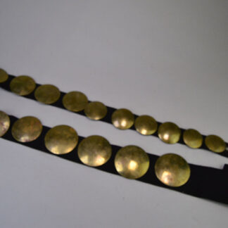Don't miss this Concho Dragger- Wool Black featuring 18 Brass Conchos and 4 spots. The crafter used black wool. measuring 58" long. One of Kind.