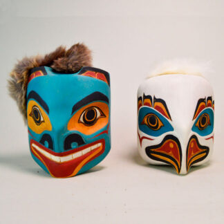 Don’t miss out on this unique set of two traditional-style maskettes in the Northwest Coast tradition. Bear: 7.5" tall, Eagle: 9" tall. one of a Kind.