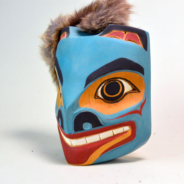 Don’t miss out on this unique set of two traditional-style maskettes in the Northwest Coast tradition. Bear: 7.5" tall, Eagle: 8" tall. one of a Kind.