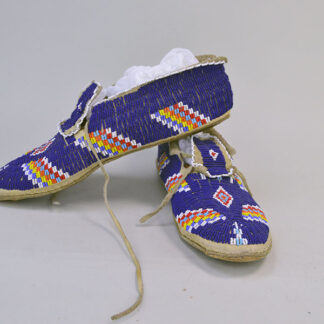 Add These Fabulous Moccasins Dark Blue Cheyenne-Style to Your Collection! measures approximately 10.5" in length, 3.5" at the widest point. One of a Kind.