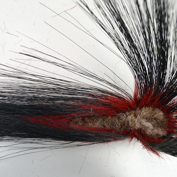 This 6" Tear Drop Turkey Beard Roach in Red is a spectacular example of mid-20th century craftsmanship. 6 inches in length and 2 inches wide. One of a Kind.