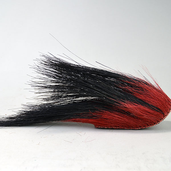 This 6" Tear Drop Turkey Beard Roach in Red is a spectacular example of mid-20th century craftsmanship. 6 inches in length and 2 inches wide. One of a Kind.