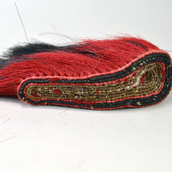 This 6" Tear Drop Turkey Beard Roach in Red is a spectacular example of mid-20th century craftsmanship. 6 inches in length and 2 inches wide. One of a Kind.