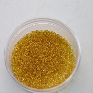 Elevate your beadwork with these Seed Beads Transparent Amber 12/0. Made in France and packaged in a generous 1 kilo. One of a Kind!