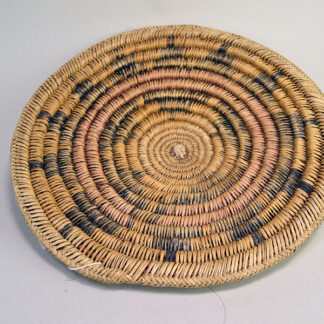 This ceremonial Hopi-style wedding tray, handcrafted by a Navajo artisan, measures 14.5 inches wide. Yucca delicately wrapped over willow One of a Kind.