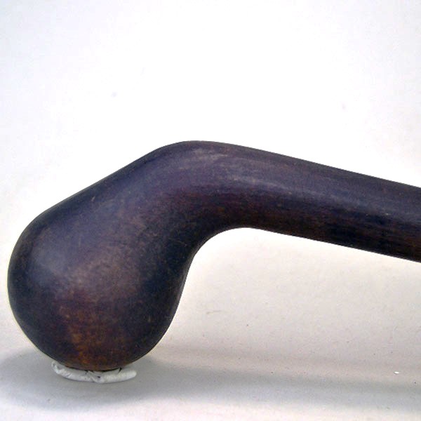 Pictured above is a close-up of the ball head, highlighting the rich stain and fine hardwood grain that define this 19" straight-shaft club