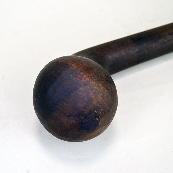 Pictured above is a close-up of the ball head, highlighting the rich stain and fine hardwood grain that define this 19" straight-shaft club