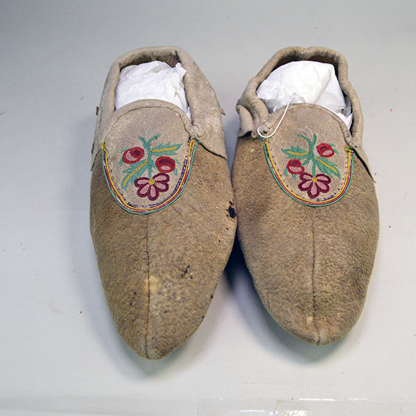 Add these Vintage Moccasins- Silk Embroidered Vamps Cree Style in the 1950s. They measure 9″ long , 3.5′ wide and 3″ high. One of a Kind.