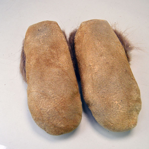 This picture displays the bottom of the Cree-style youth moccasins, crafted from supple moosehide leather and shaped for comfort and traditional wear.