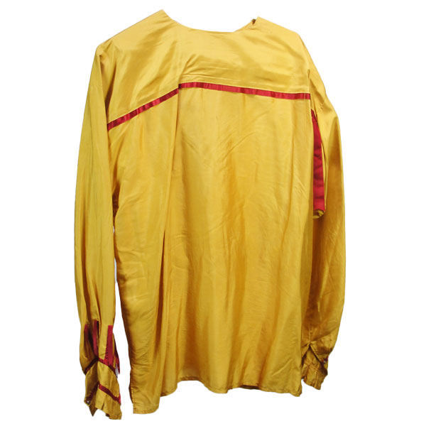 The photo showcases the back view of this elegant ribbon shirt, highlighting its gold silk body, burgundy ribbon coordinated scarf set with fastened cuffs