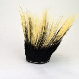 This Roach – Eastern Round Style is a striking example of traditional Native American headwear. Outer row is adorned with rich black bear fur. One of a Kind