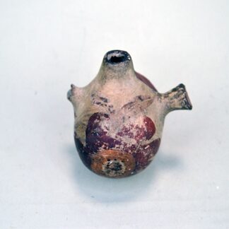 Top view of small canteen Acoma style decorated with floral design on one side and red on the other.